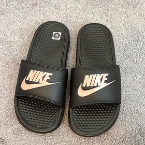 Nike Black Slides with Metallic Logo